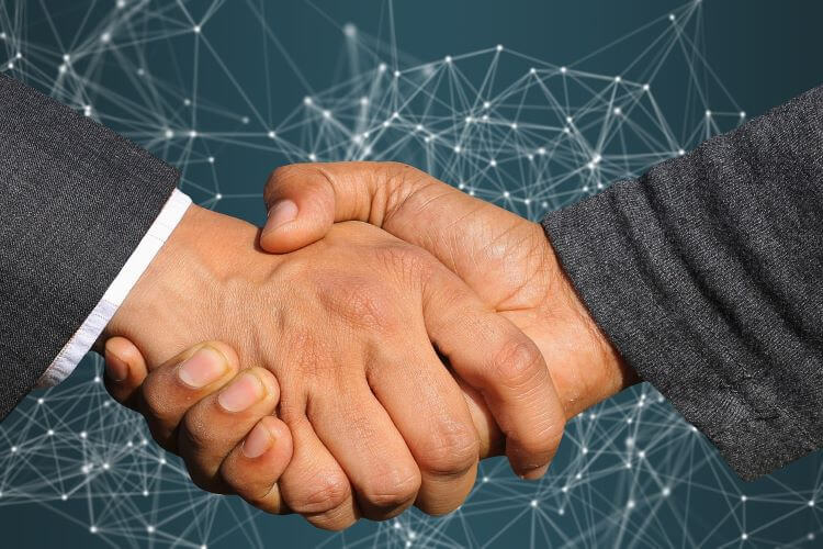 Hand shake between partners
